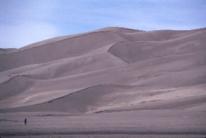 Dunes Dwarf a Hiker